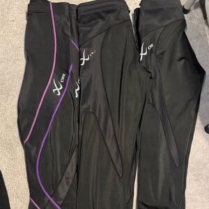 Set of three CWX compression leggings. Size S S M